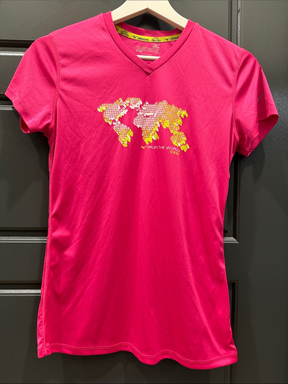 Mizuno Hot Pink V-Neck Short Sleeve Tee with Yellow World Map Graphic